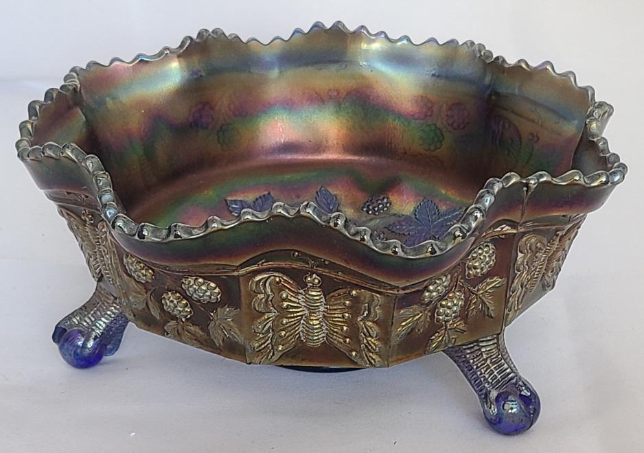 Fenton Butterfly & Berry Amethyst Ruffled Bowl: Plain interior carnival glass bowl.