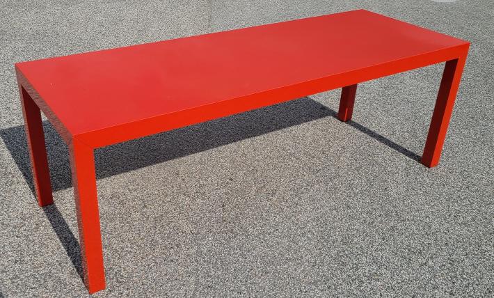 Vintage Large Industrial Red Enamel Dining Table: This is a large metal table, possibly steel, and it appears to be coated with a layer of white and a layer of red enamel paint. Measures approximately 84" long by 30" wide by 29.25" tall. There is som