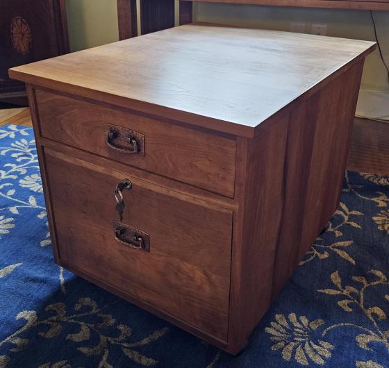 Stickley Filing Cabinet on Wheels: Measures approximately 27.5" deep by 22" tall by 21.5" wide. Easily moves across the floor and is in excellent condition. Shipping is not available on this lot.