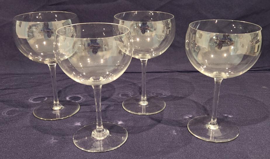 4 Baccarat Crystal Wine Goblets: Excellent condition.