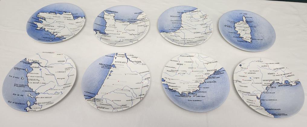 K G Luneville Map of France Plate Set: 8 plate set made in France by K G Luneville. Set creates the map of France. Each plate measures 9" in diameter. No chips, cracks or condition flaws.