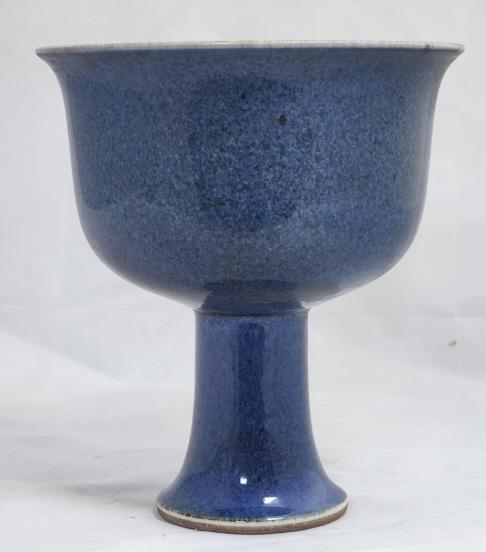 Chinese Xuande Blue Glaze Goblet: A Ming Dynasty style Blue Glaze Goblet. The bottom of the goblet is stamped with the Xuande Period (1426-1435) mark. The goblet measures 6.5" tall and 6" in diameter at its widest.