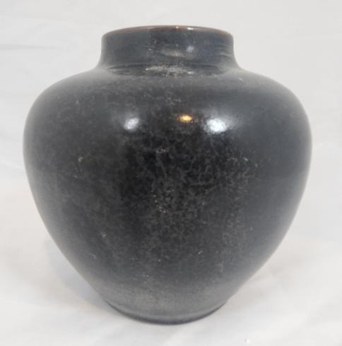 Chinese Qianlong Brown Guanyao Pot: Antique Chinese guanyao pot, features a dark brown glaze and 7.5" wide body. The backstamp features a Qianlong Period (1736-1795) mark in Imperial "seal script". The pot has some signs of wear due to