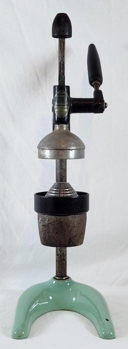 Vintage Hamilton Beach Porcelain Base Juicer: Vintage juicer with porcelain base. Measure 19.5" in height, 6." wide and 9" deep. Looks to be in good working condition with some signs of age and wear. Small chip in one of the porcelain feet.