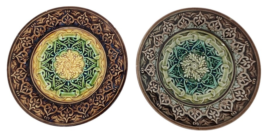 French Victorian Majolica Pottery U&CS Plates: Pair of antique Victorian U&CS Majoilca pottery plates, each 5 3/4" in diameter with factory marks on the bottom from Utzchneider et Compagnie of Sarreguemines, France (U&CS).