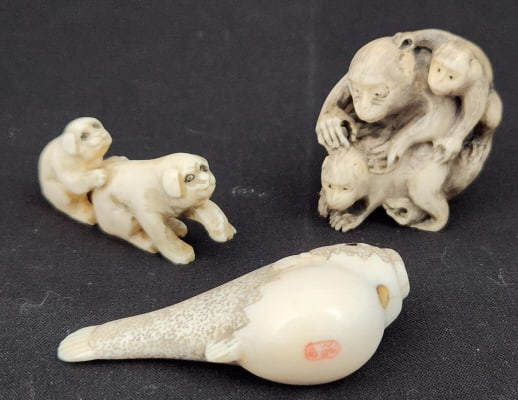Japanese Hand Carved Animal Figurines Netsuke: 3 hand carved Japanese figurines, possibly Netsuke, carved from bone and/or boxwood. The lot includes two monkey figurines and a Pufferfish, please see the photos provided for size and make details.