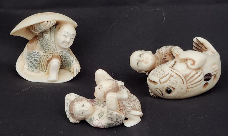 Japanese Hand Carved Figurines Possibly Netsuke: 3 hand carved Japanese figurines, possibly Netsuke, carved from bone and/or boxwood. Be advised that one of the figurines portrays adult themes, see the photos for details.