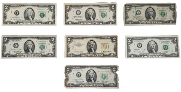 Lot of U.S. $2 Currency Notes: Seven United States currency $2 bills. Please see photos provided for condition details. All bills include a protective plastic sleeve.