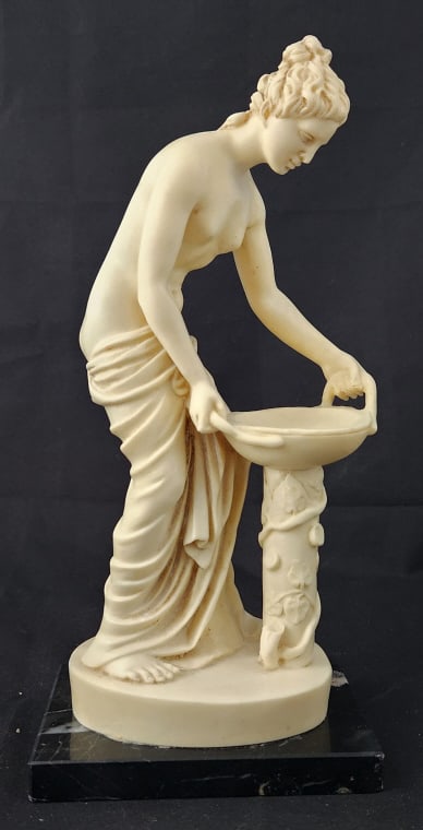 A. Santini Italian Woman at Basin Classic Figure: Italian A. Santini alabaster or resin sculpture. Original Santini label on the bottom of the base. Please see the photos provided for condition details. Measures 4 5/8" W x 10" H x 3 1/8 D. Weighs 2 l