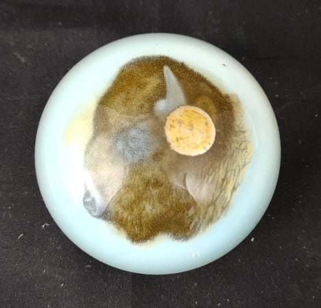 Vintage Buffalo Motif Art Glass Paperweight: Glass paperweight featuring an image of a Buffalo. Original label on the top, but worn. Measures 3 1/2" W x 2 1/4" H x 3 1/2" D. Weighs 1.25 lbs.