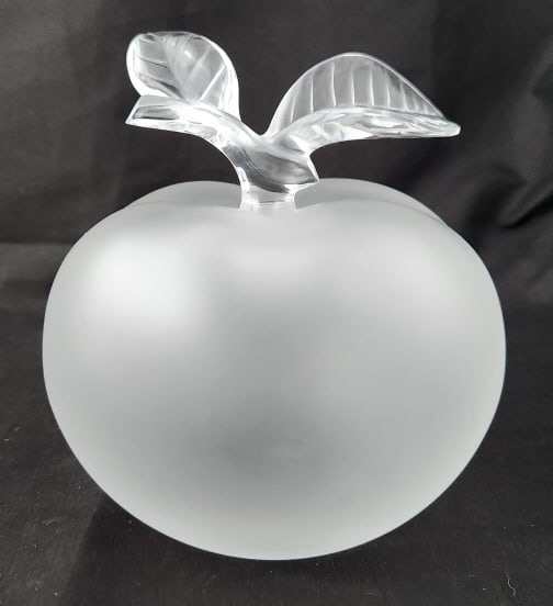 Lalique Frosted Crystal Pomme Perfume Bottle: Frosted Crystal glass "Pomme" apple perfume bottle. Measures 5 1/4" W X 5 1/2" H X 5 1/4"D. The box measures 6" W x 4 3/4" H x 6" D . Weighs 3 lbs. total.