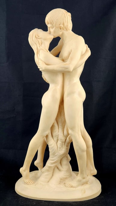 A. Santini Lovers Italian Sculpture: A. Santini "Lovers" sculpture made from Italian alabaster or resin. Measures 7 1/2' W x 14 5/8" H x 4 7/8" D. Weighs 5.25 lbs.