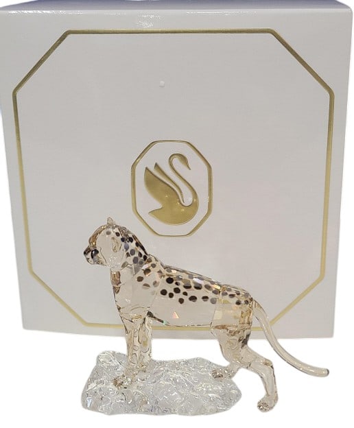 Swarovski SCS Elegance of Africa Cheetah Jabari: Swarovski Crystal SCS 2023 Elegance Of Africa Cheetah Baby Jabari figurine #5636484. Includes original box. Piece is 3 5/8" x 1 1/4". In excellent condition.