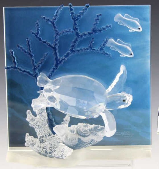 Swarovski Wonders of the Sea Eternity in Color: The first photo is a stock photo, but is a very good representation of the piece. The 2nd photo shows the piece in the home, there is a cardboard insert and original box included but not shown in the 