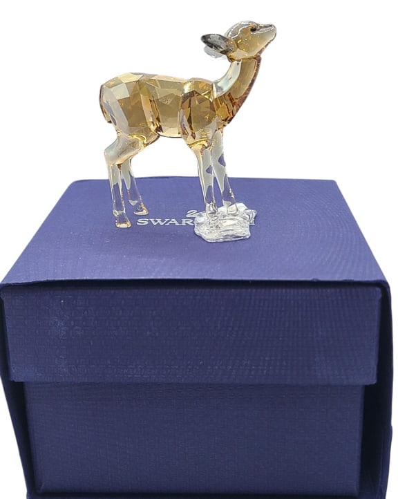 Swarovski 2020 SCS Fawn Signed Crystal Figure: Swarovski 2020 SCS Fawn Signed Crystal Figure #5538222. Includes original box, signature on the base. In excellent condition.
