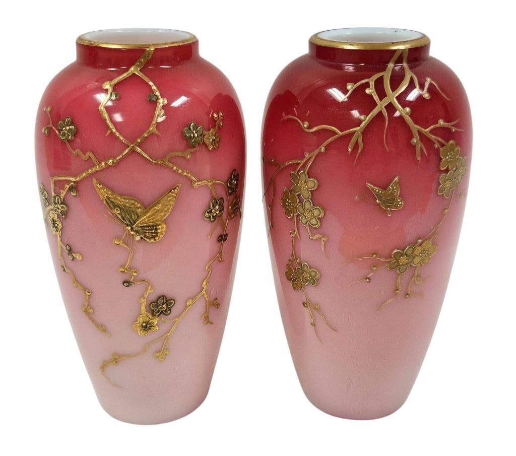 Antique Victorian Peachblow Cased Glass Vase Pair: Antique Victorian Thomas Webb English peachblow cased glass vase pair. Jules Barbe gilt decoration in the Japanese aesthetic style with butterflies and blossoms. Each vase measures approximately 5.25"