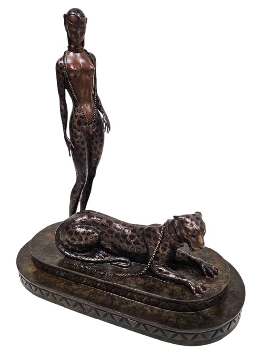 Vintage 1980 Erte Woman & Panther Bronze Sculpture: Romain De Tirtoff, "Erte" (Russian/French, 1892-1990) cold-painted bronze sculpture titled "La Femme a la Panthere" (Woman with a Panther). Depicts a woman in a panther suit with a recumbent panther o
