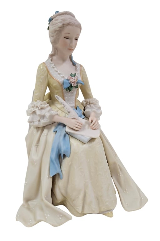 Vintage Cybis Historical Abigail Adams 10" Figure: Vintage Cybis porcelain bisque historical series Abigail Adams at chair writing. Yellow dress. Signed Cybis and numbered 65 from limited run. Measures approximately 10" tall7" wide and 5.5" deep. No c