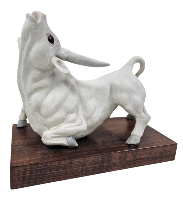 Cybis 13" Porcelain Bull LE Statuette #55: Vintage Cybis porcelain bisque limited edition bull sculpture / statuette. Signed Cybis and numbered 55 out of limited run on inside of back leg. Bull is approximately 13" long on 14" by 7" base. 12.5