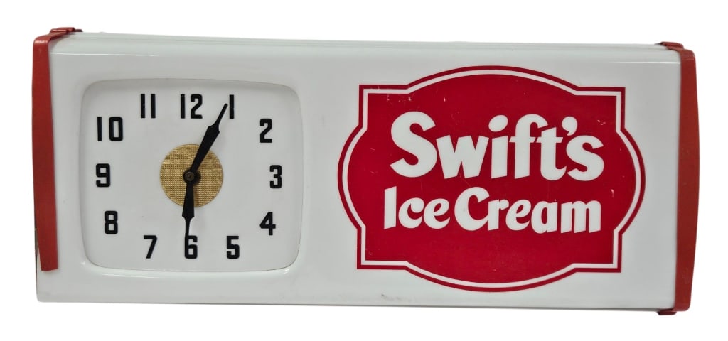 Vintage Swift's Ice Cream Light-Up Clock Sign: IMPORTANT NOTE: Please be advised that we offer reasonably priced in-house shipping, but you must select Arrange My Own Shipping as part of your post-auction invoice options. Vintage circa 1950s-1960s