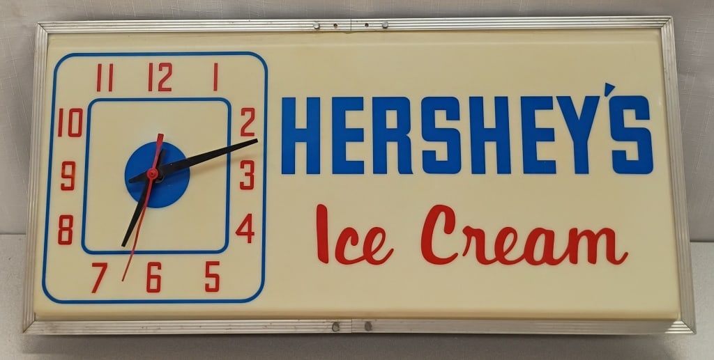 Vintage Hershey's Ice Cream Lighted Clock Sign: IMPORTANT NOTE: Please be advised that we offer reasonably priced in-house shipping, but you must select Arrange My Own Shipping as part of your post-auction invoice options. Circa 1960s Hershey's Ice