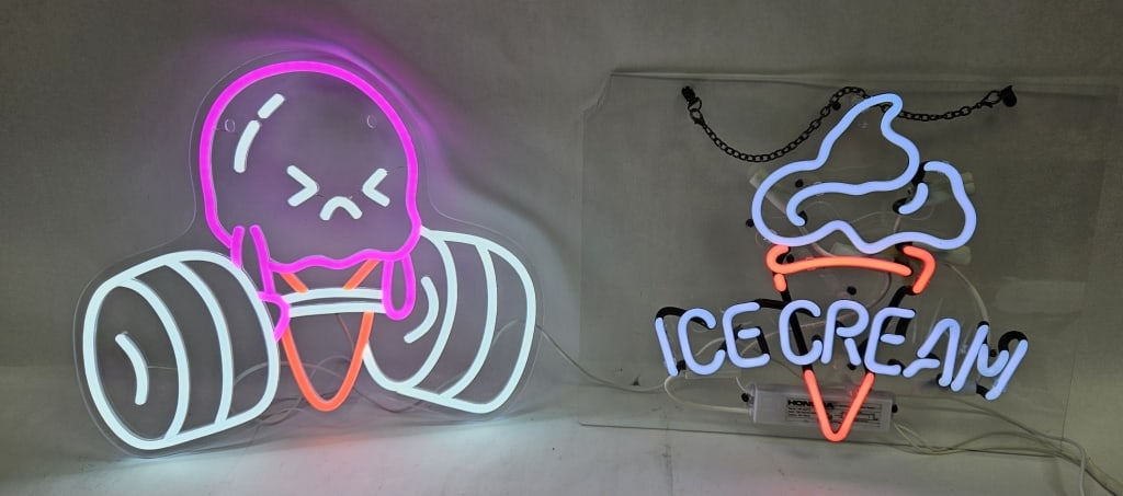Two Small Neon Ice Cream Signs: IMPORTANT NOTE: Please be advised that we offer reasonably priced in-house shipping, but you must select Arrange My Own Shipping as part of your post-auction invoice options. Glowneon strip weightlift