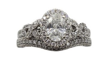 Diamond Infinity Twist Engagement & Wedding Set: IMPORTANT NOTE: Legacy Auctions offers reasonably priced in-house and 3rd Party shipping options, but you must select Arrange My Own Shipping as part of your post-auction purchase options. Appraisal