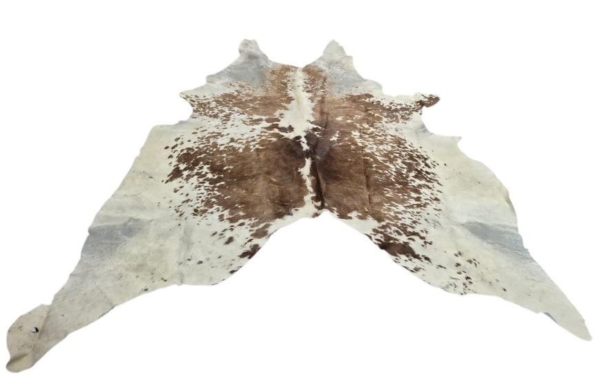 Genuine Cowhide Rug: IMPORTANT NOTE: Legacy Auctions offers reasonably priced in-house and 3rd Party shipping options, but you must select Arrange My Own Shipping as part of your post-auction purchase options. Genuine cow