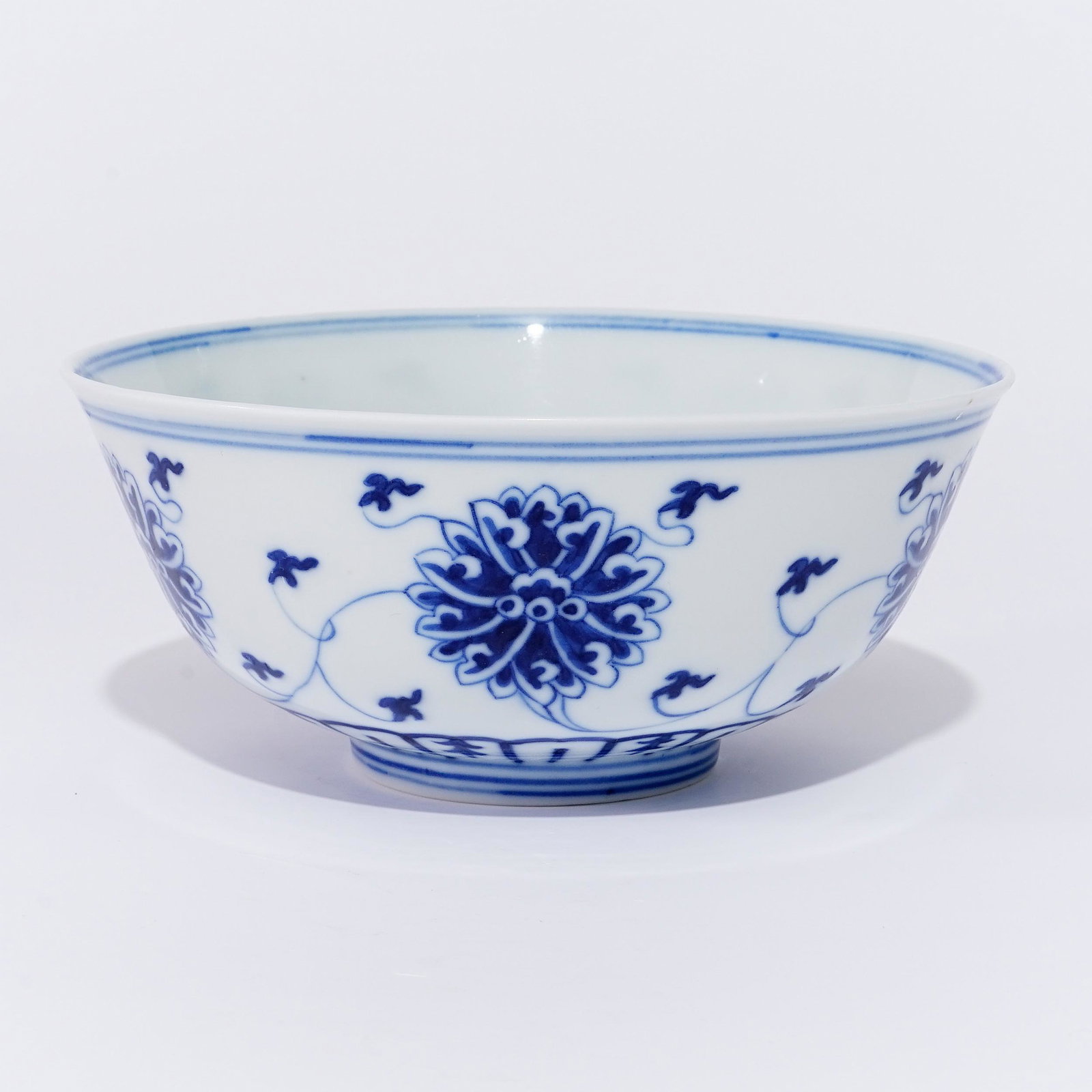 A underglaze blue bowl with a floral pattern in the Guangxu period of the Qing Dynasty (1 of 4)