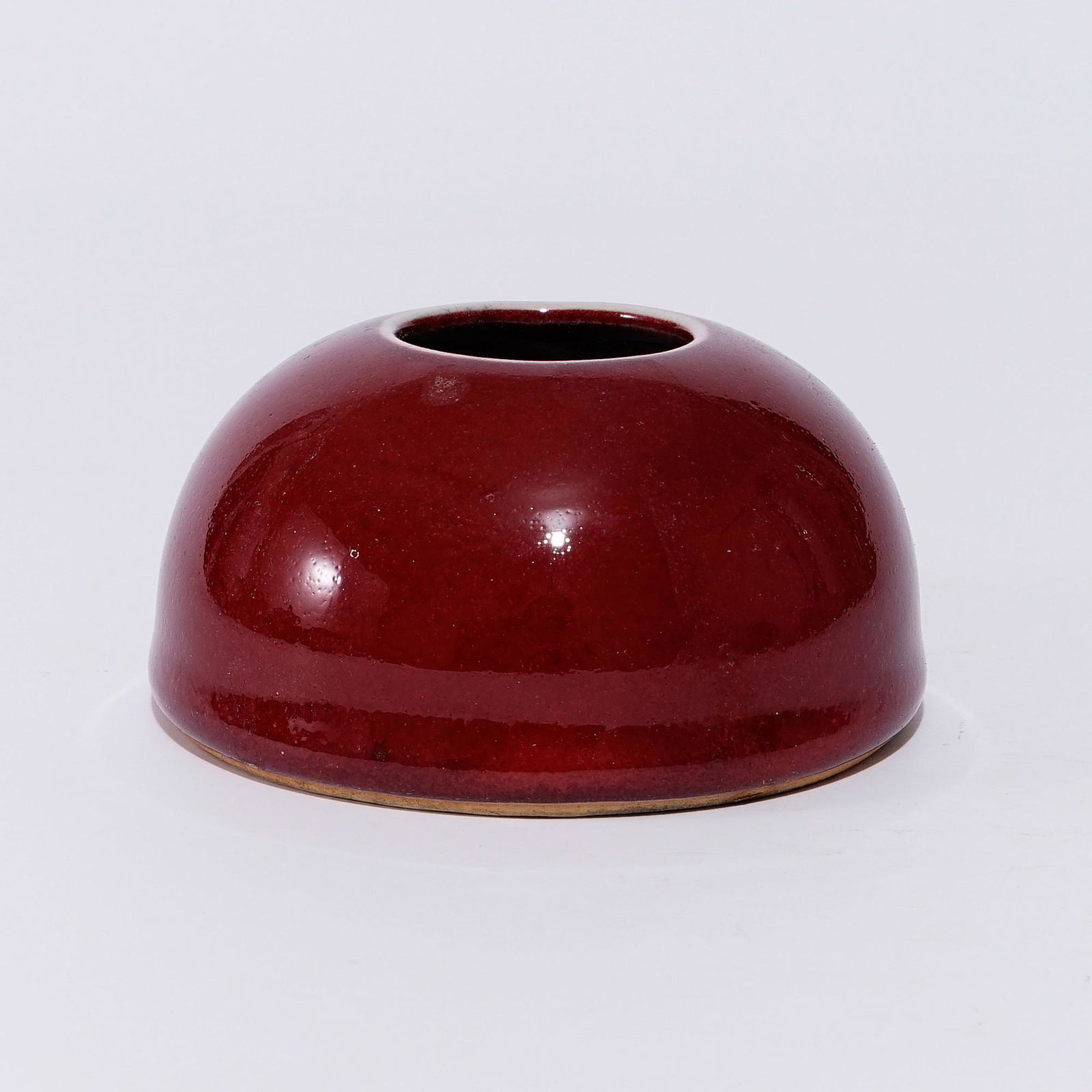 A red glaze water container in the Qing Dynasty (1 of 4)