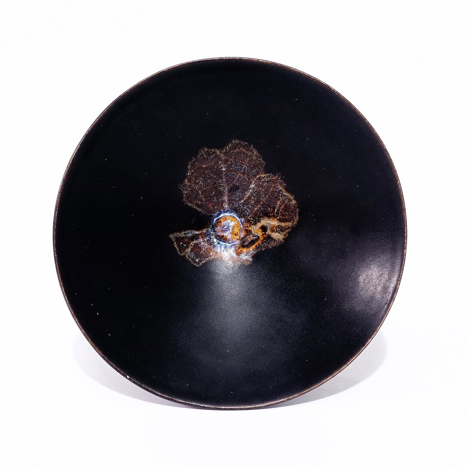 A  Jizhou ware cup with leaf pattern in the Song Dynasty (1 of 4)