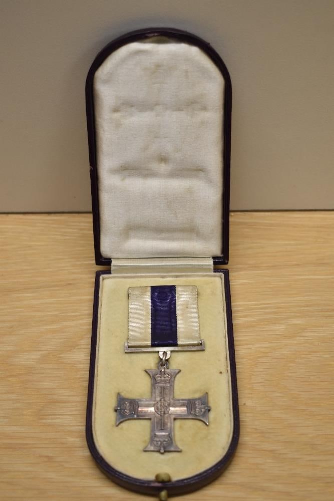 A George V Military Cross in original box with ribbon, unnamed, The Military Cross was instituted in: A George V Military Cross in original box with ribbon, unnamed, The Military Cross was instituted in 1914 for Gallantry in the field by Officers & Warrant Officers