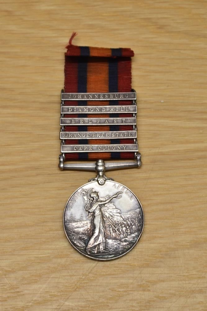 A Queen Victoria Queens South Africa Medal with five clasps, Cape Colony, Orange Free State,: A Queen Victoria Queens South Africa Medal with five clasps, Cape Colony, Orange Free State, Belfast, Diamond Hill and Johannesburg, with ribbon to 3796.PTE.E.JONES.6/DRGN GDS, campaign Anglo-Boer War