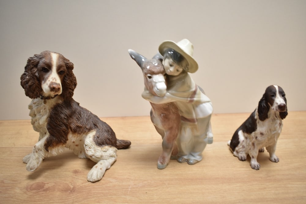 A Lladro porcelain figure group 'Platero & Marcelino' boy with donkey, 20.5cm small flake to hat: A Lladro porcelain figure group 'Platero & Marcelino' boy with donkey, 20.5cm small flake to hat rim.