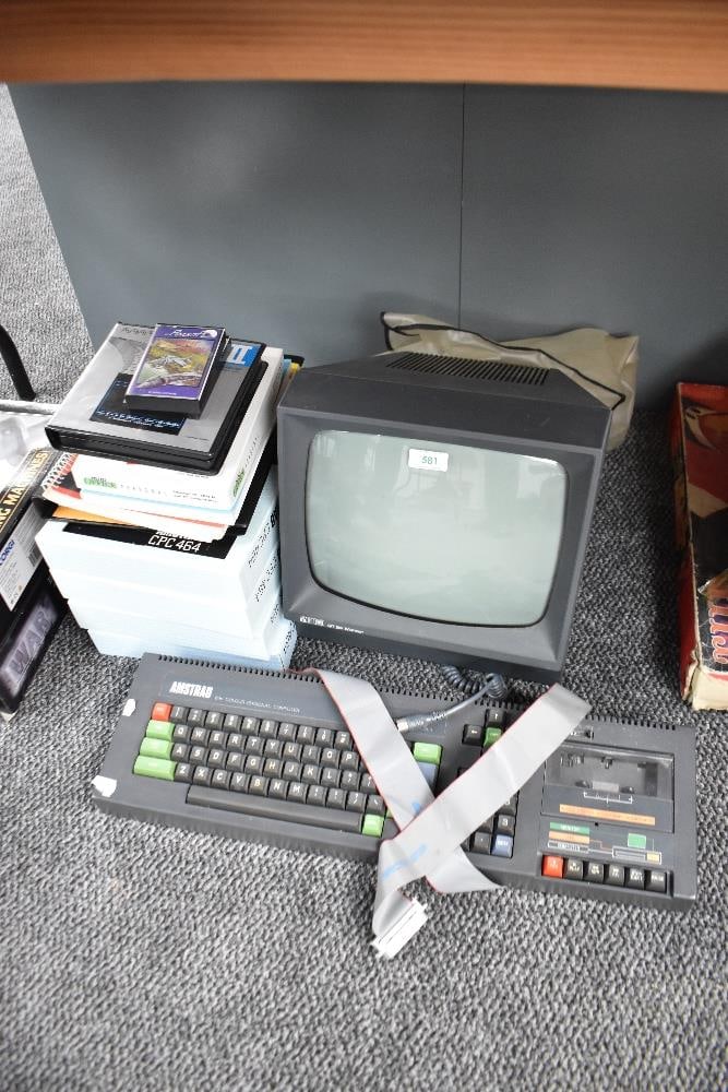 An Amstrad 64K Colour Personal Computer with monitor, 4 part operating system set and Mini Office (1 of 1)