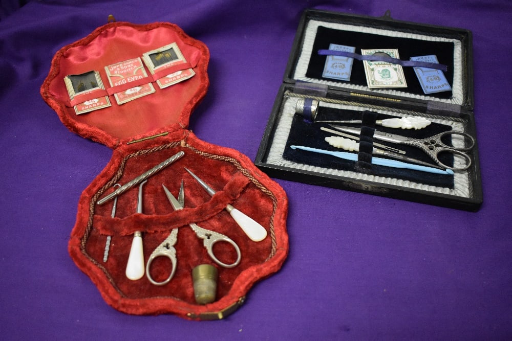 Two Edwardian sewing kits.: Two Edwardian sewing kits. good condition, slight wear to edges of red case.