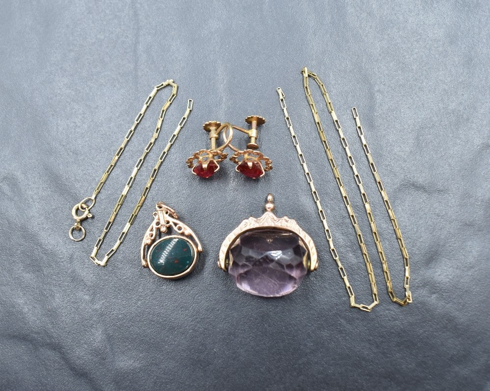 A small selection of 9ct gold jewellery including broken chain, two rose gold watch fobs and a (1 of 2)