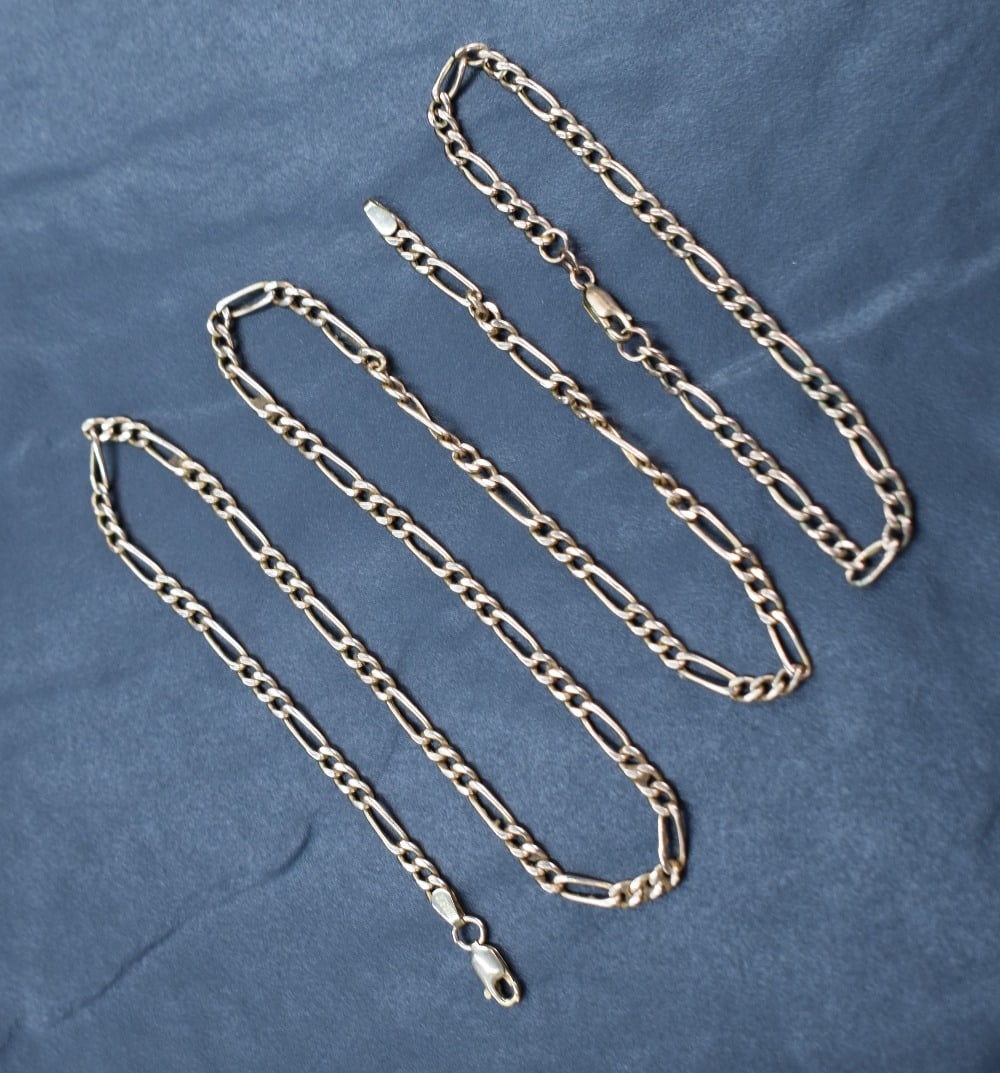 A 9ct gold figaro chain, approx. 52.5cm, sold along with a 9ct gold figaro chain bracelet approx. (1 of 1)