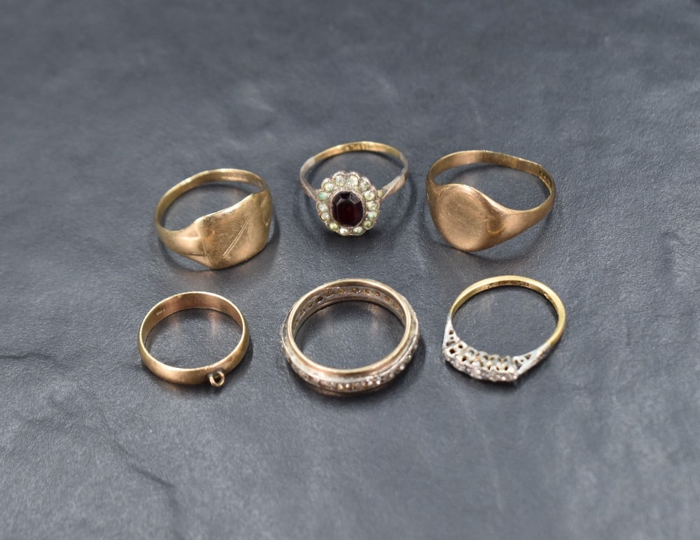 A small selection of 9ct gold and yellow metal rings including signet, eternity, dress style etc, (1 of 1)