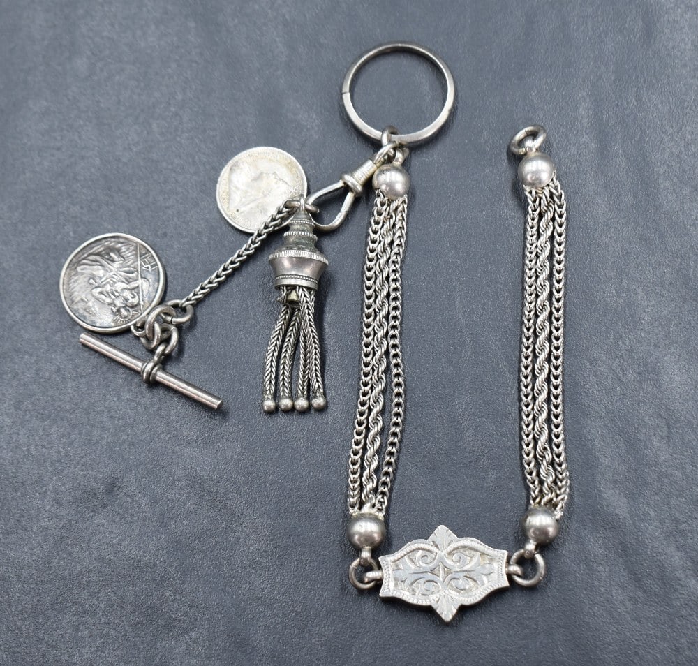 A white metal Albertina with additional silver coin & St Christopher charm and split wedding band: A white metal Albertina with additional silver coin & St Christopher charm and split wedding band stamped palladium attached, approx 8' & 25g