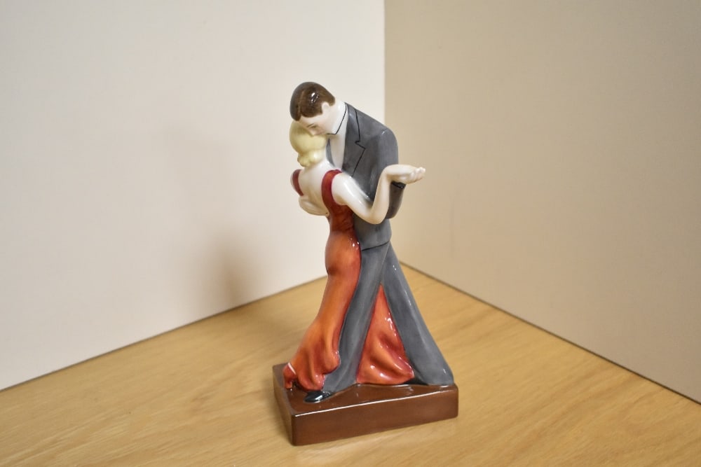 A Royal Worcester limited edition Art Deco design figure group 'The Dancers' modelled by Doris: A Royal Worcester limited edition Art Deco design figure group 'The Dancers' modelled by Doris Lindner, number 5/500, with packaging. in good condition with no aparant damages or repairs, some slight