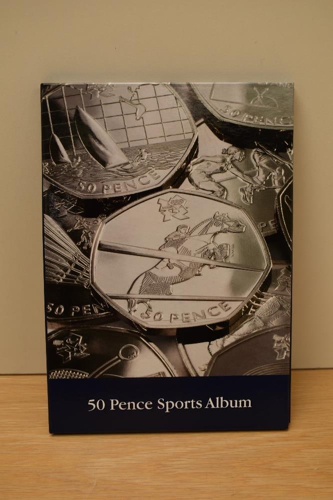 A Queen Elizabeth II London Olympics 50p Coin Collection, 15 coins in total, in a Lighthouse folding (1 of 2)