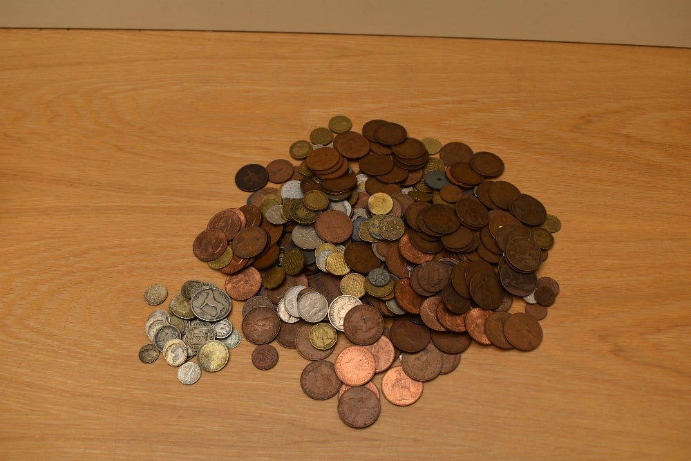 A collection of GB and World Coins including 1.9oz of World Silver, Half Penny, Penny, Farthings, (1 of 1)