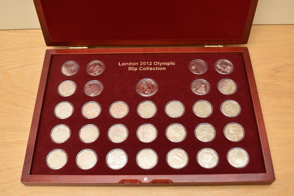 A Queen Elizabeth II United Kingdom London 2012 Olympic Commemorative Fifty Pence Collection (1 of 1)