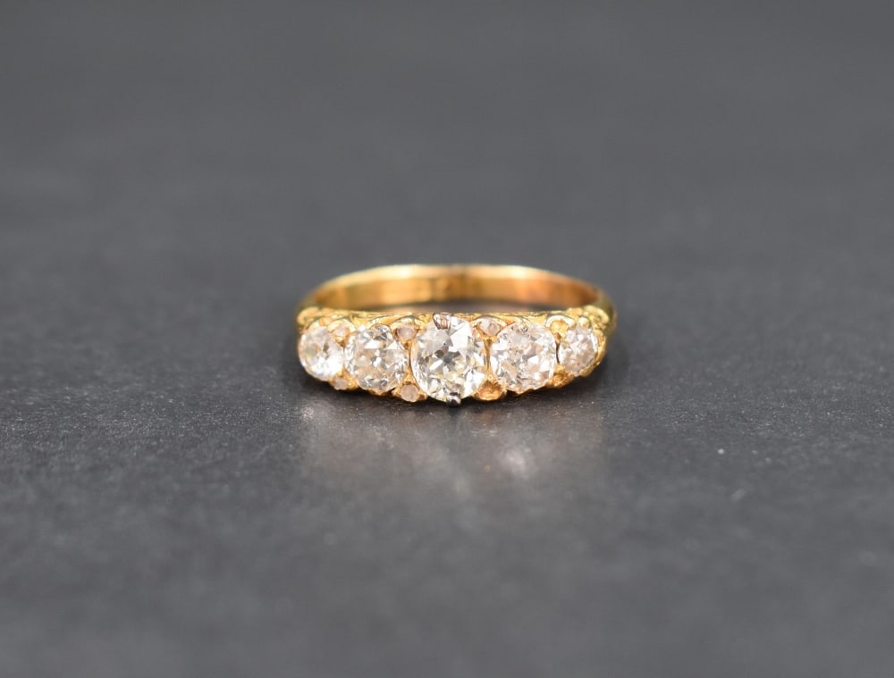 A graduated five stone diamond ring having five old cut diamonds, total approx 1.2ct with diamond (1 of 4)