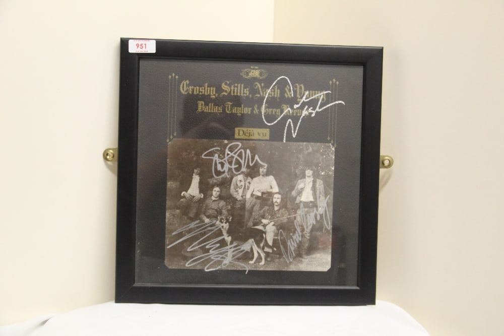 A signed and framed Crosby , Stills . Nash and Young ' Deja-Vu ' album sleeve - whilst we can't (1 of 5)