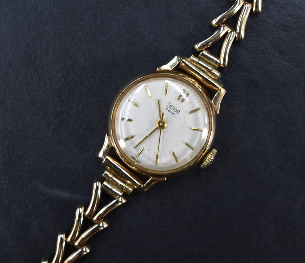 A lady's 1960's 9ct gold wrist watch by Tudor having Rolex case no:404322, baton numeral dial with (1 of 5)