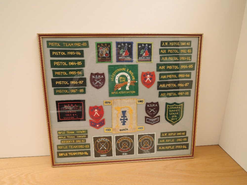A framed and glazed Shooting Patches display, 1977-1988 including Leicestershire & Rutland Rifle: A framed and glazed Shooting Patches display, 1977-1988 including Leicestershire & Rutland Rifle Association, Bisley, NSRA Master Shot, Rifle League etc, 35+, 46cm x 53cm