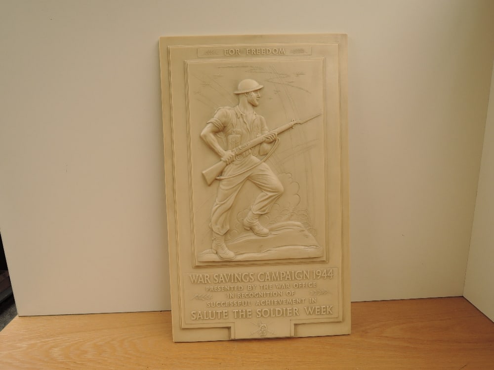 A Bakelite For Freedom War Savings Campaign 1944 Panel, presented by the War Office in Recognation: A Bakelite For Freedom War Savings Campaign 1944 Panel, presented by the War Office in Recognation of Successful Achievement in Salute The Soldier Week, made by De La Rue Plastics, 58cm x 36cm