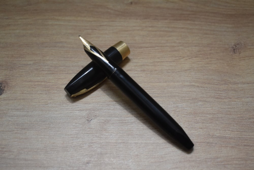 A Sheaffer PFM snorkel fill fountain pen in black having Sheaffer 14K 585 nib (1 of 3)